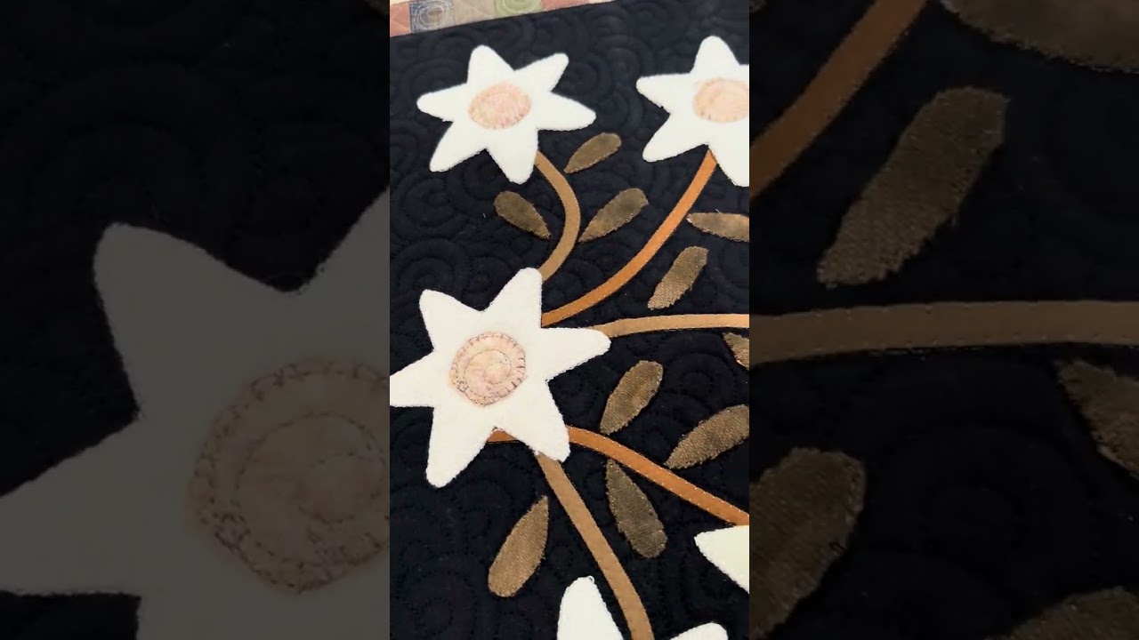 Custom quilting details on Miriam’s Quilt 