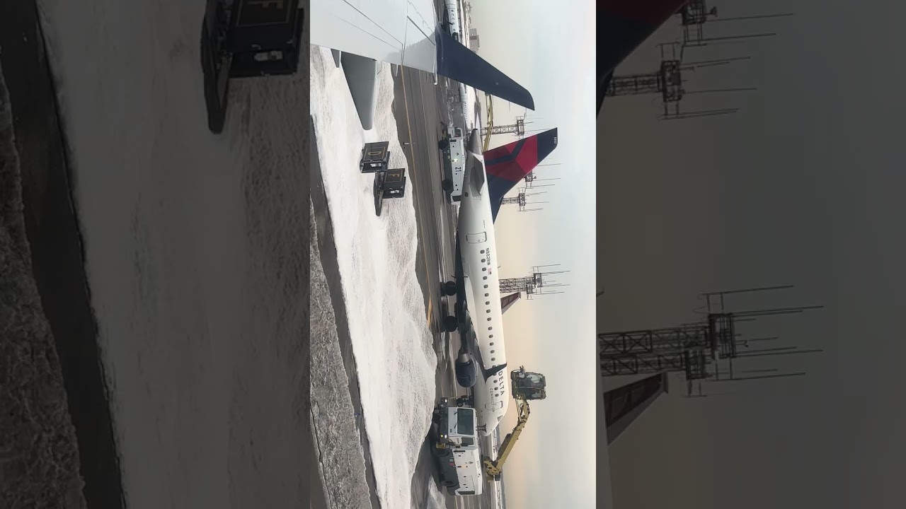 This is what it looks like when they de-ice a plane