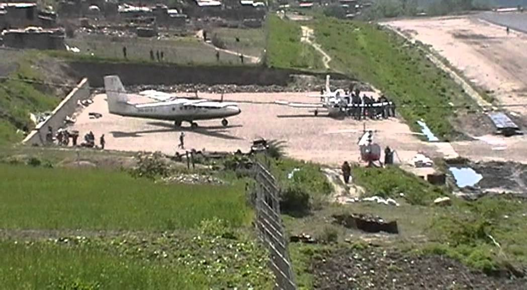 Simikot, Nepal. Plane landing from top of runway. May 2011