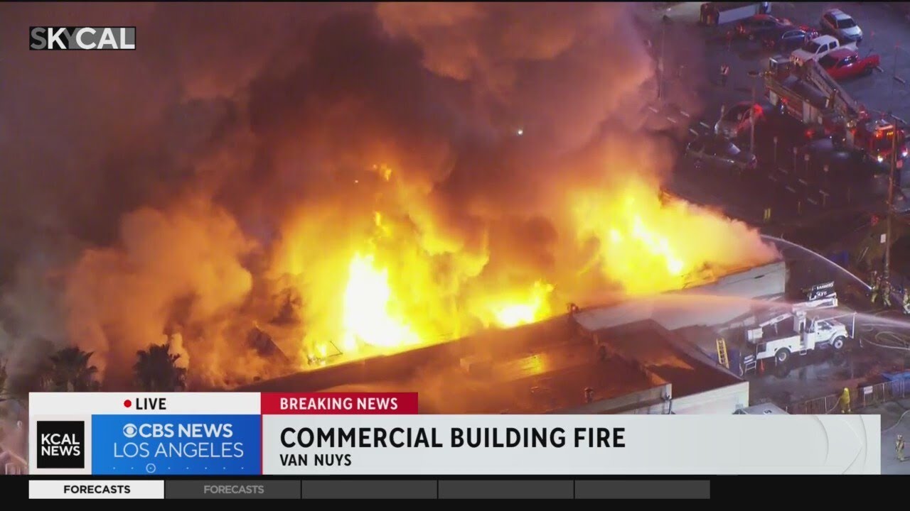 Firefighters battle Greater Alarm fire at commercial building in Van Nuys