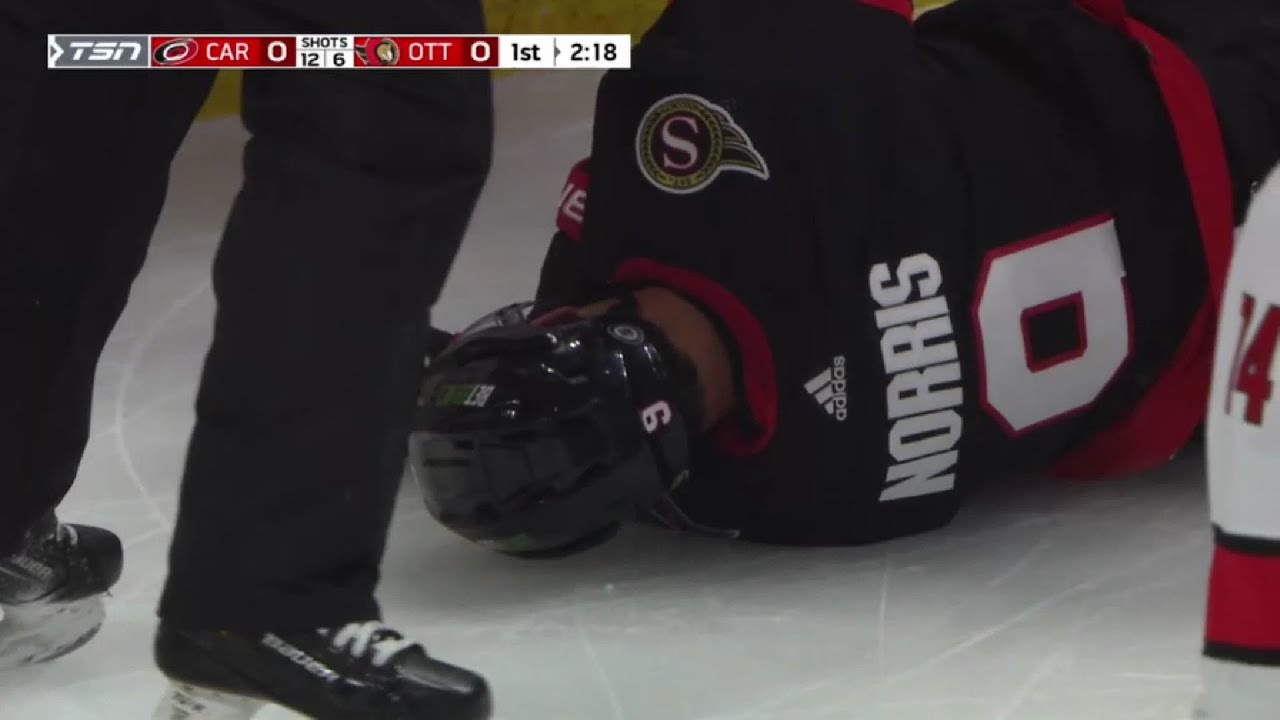 Josh Norris down after a light hit by Andrei Svechnikov