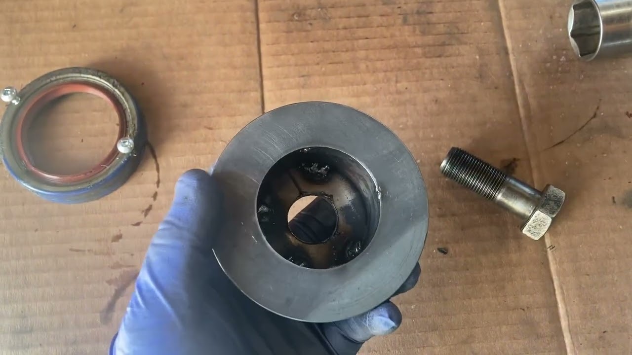Dodge Magnum engine replace front crank seal and install modified crank sensor 