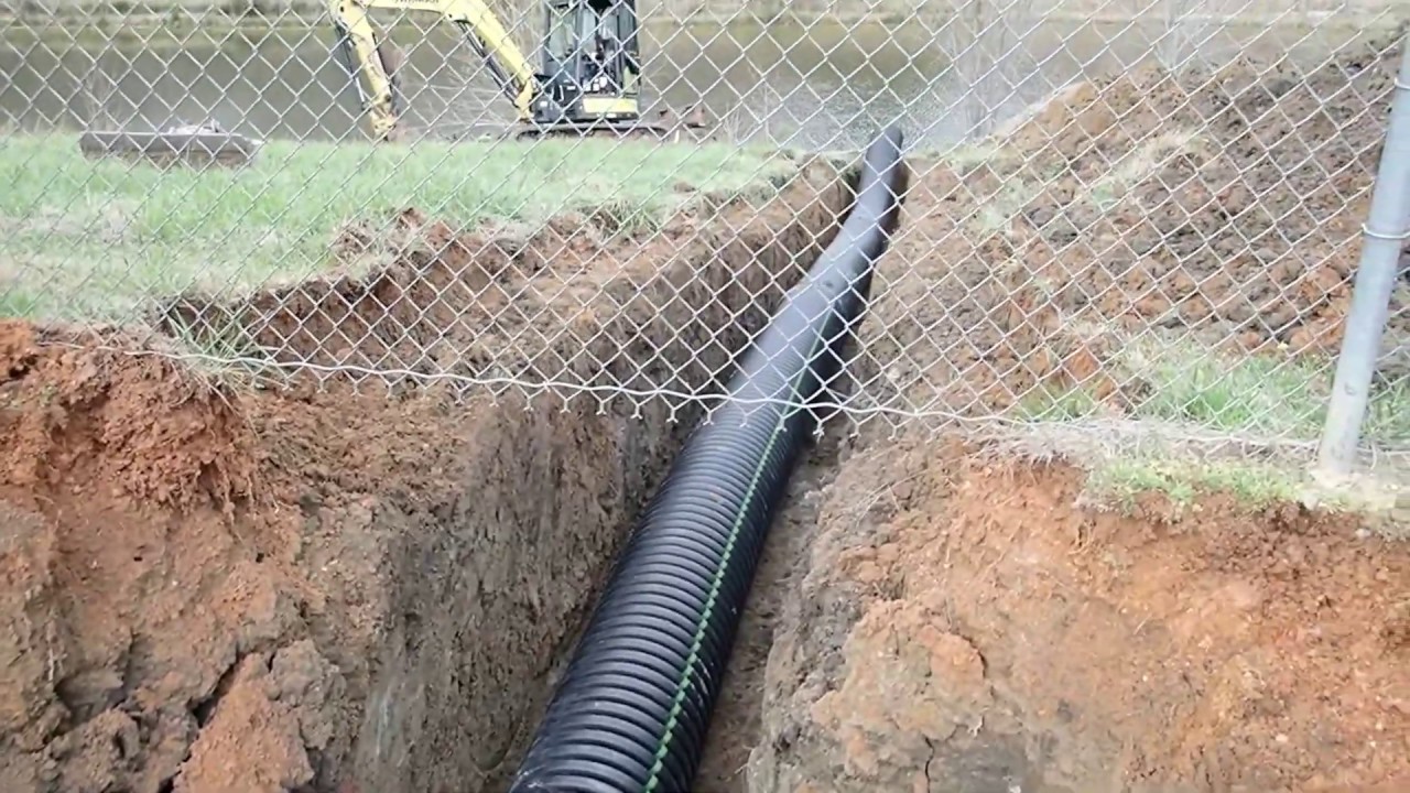 Installing And Backfilling Drain Pipe
