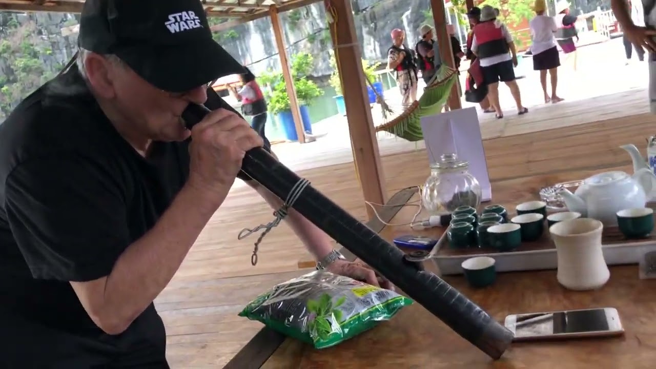 Foreigner Taste Vietnamese Tobacco Water Pipe on Private Vietnam Tours from Australia