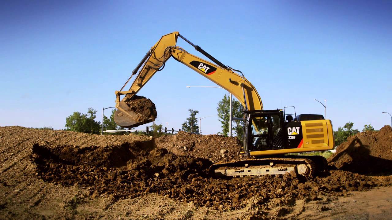 The Cat® 329F Hydraulic Excavator at Work Digging and Stockpiling