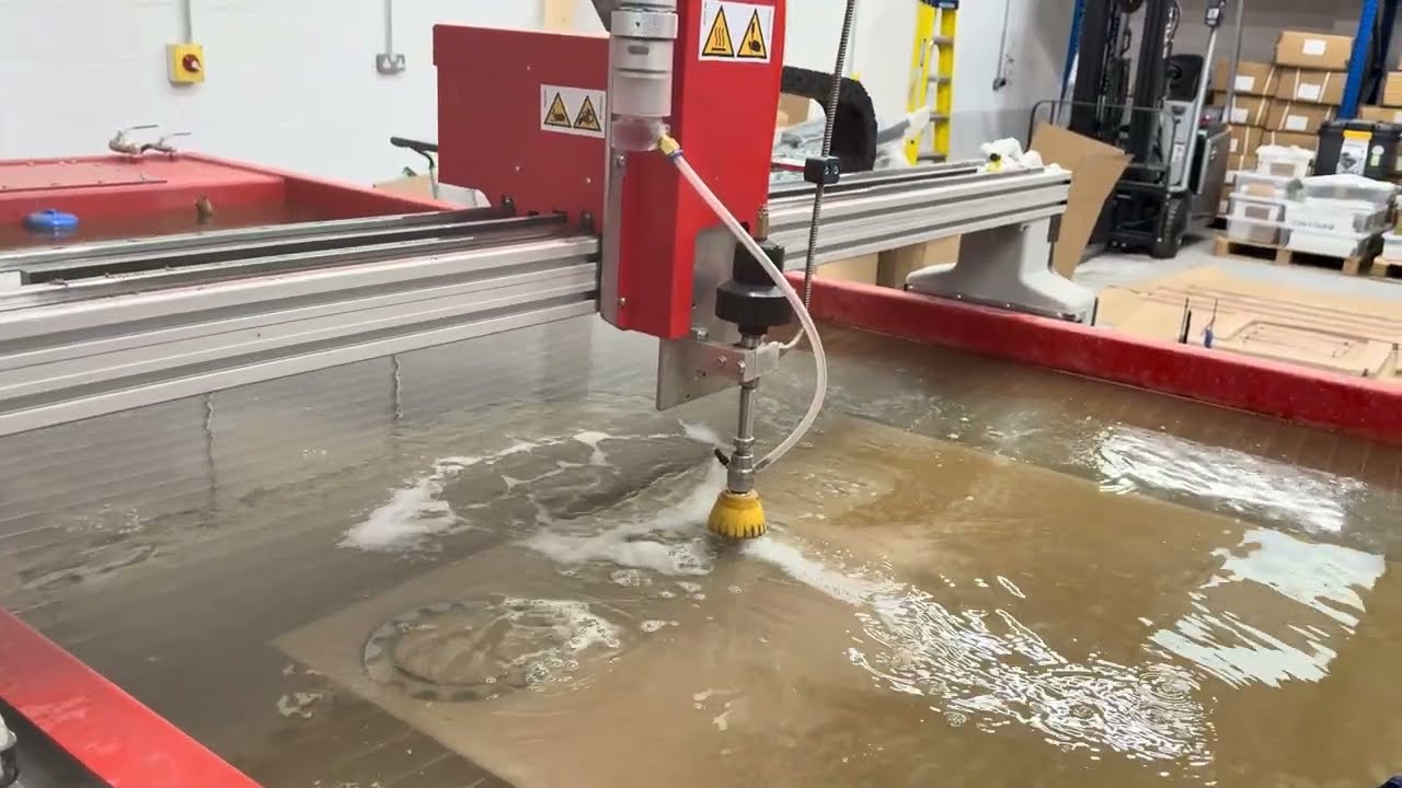 CNC Waterjet cutting a sign