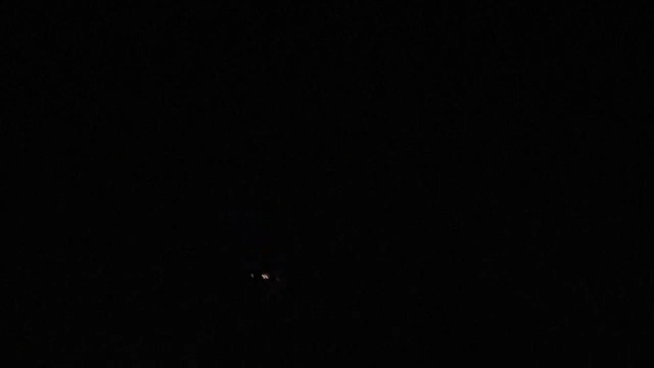 JAL Boeing 777W [JA734J] flying above at night