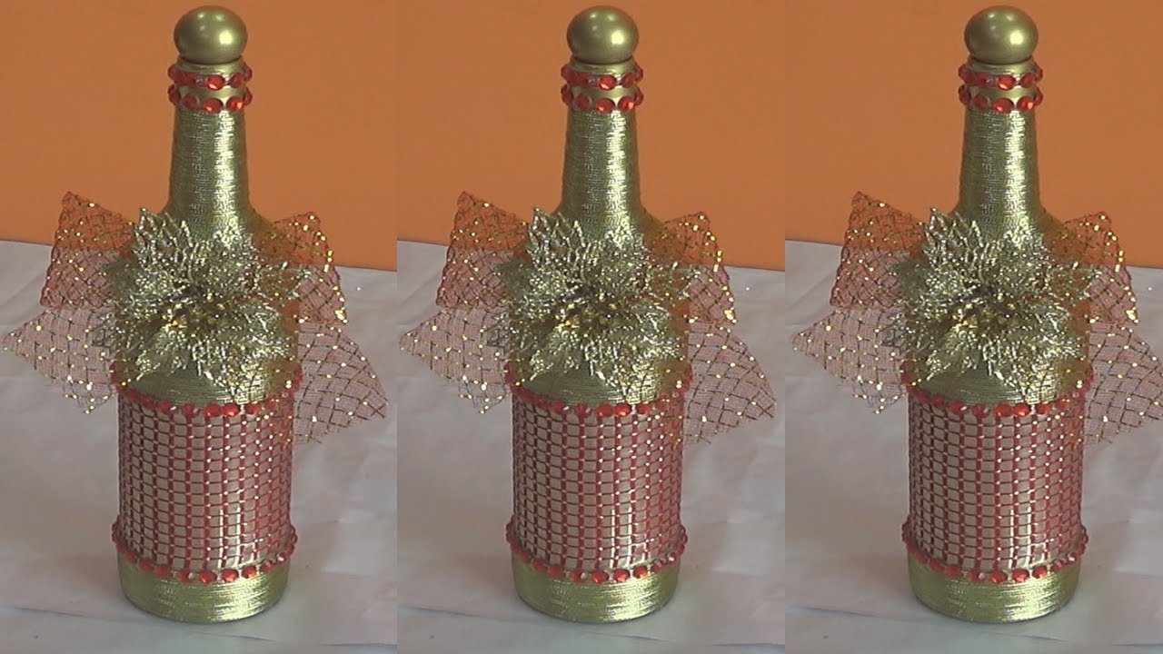 GARRAFA NATALINA DECORADA COM FIO OURO