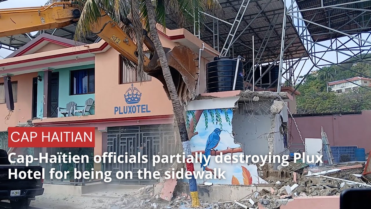 Cap Ha&iuml;tien officials partially destroying Plux Hotel for being on the sidewalk