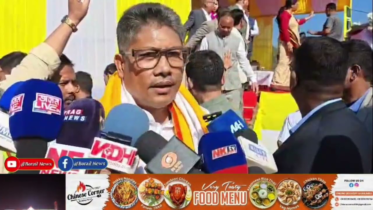 Water Resources Minister Pijush Hazarika distributes cheques. 