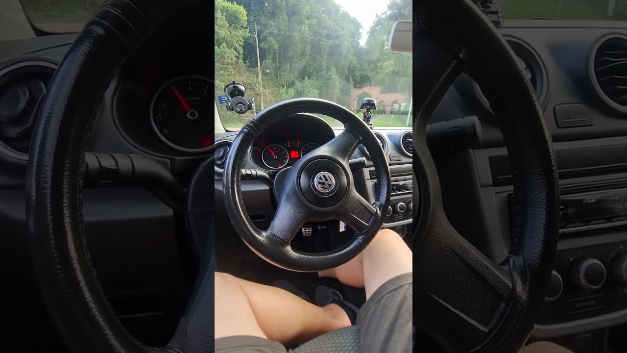 Young Boy revving really HARD his car. 