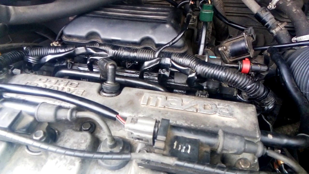 Стук в районе крышки клапанов двигателя Mazda MPV FS DE