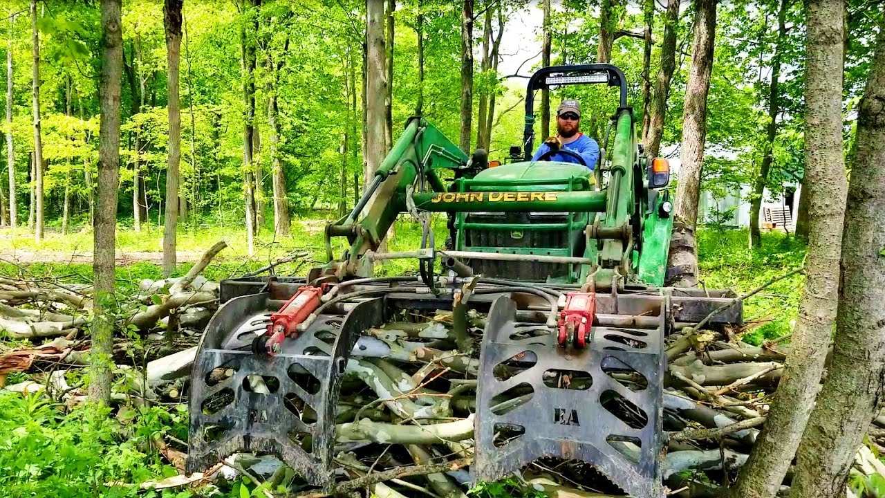 Why You Need a Grapple Bucket for Your Tractor - Everything Attachments Wicked Root Grapple