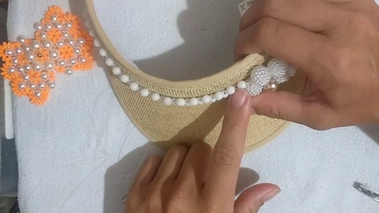 Pregando trama na viseira