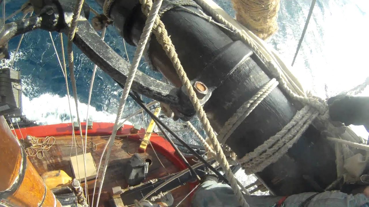 Furling fore-course sail on HMS Bounty and broken topmast