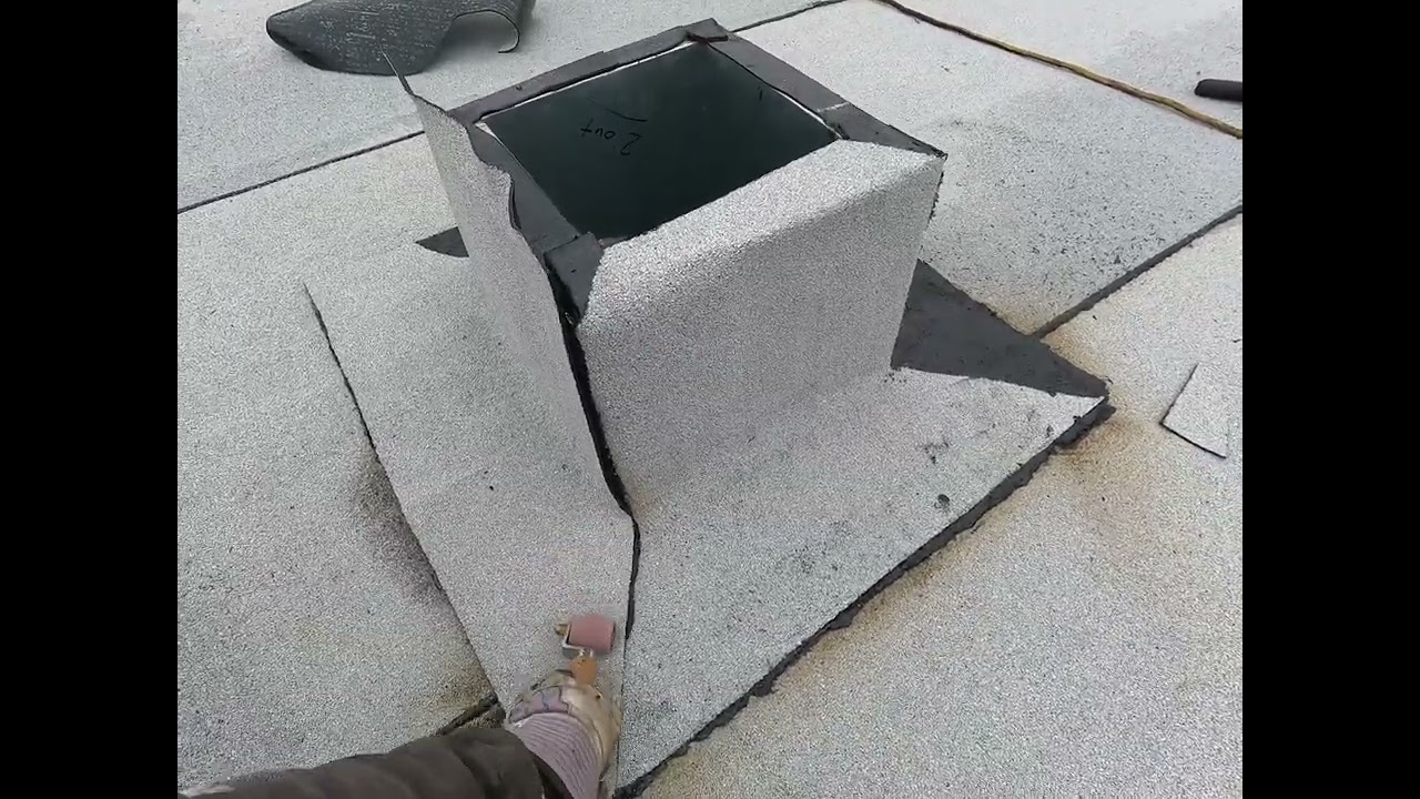 Flashing a small roof curb with torch