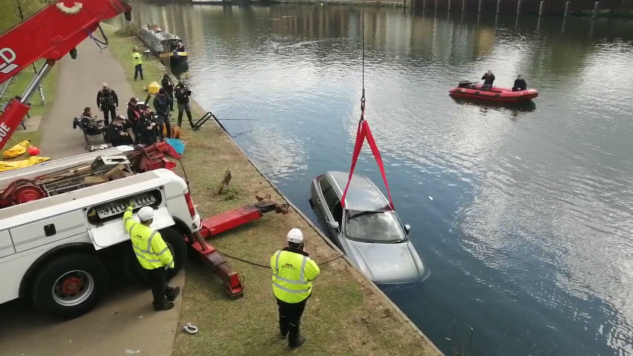 Police divers recover a car from River Thames, Reading after a police chase.