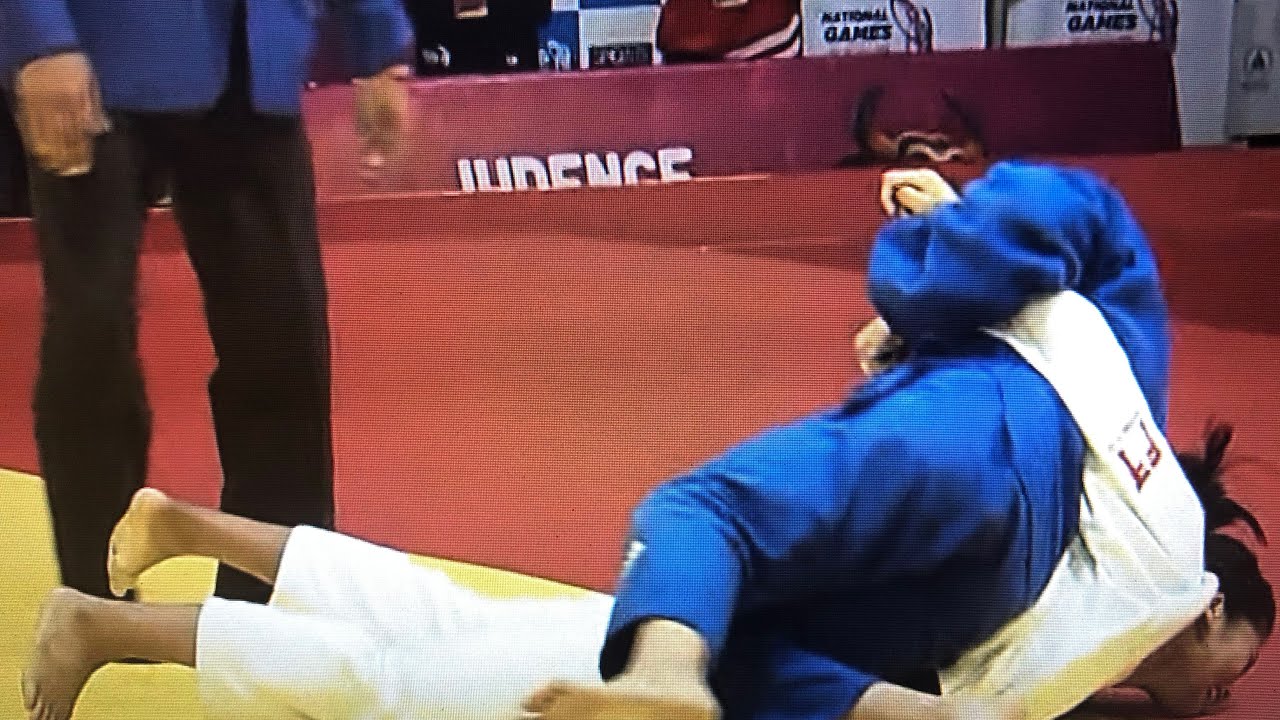 Women judo arm break. Judo girl breaks her opponent arm