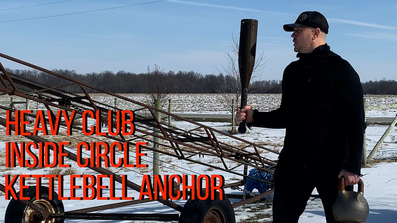 Heavy club inside circle with a kettlebell low outside anchor