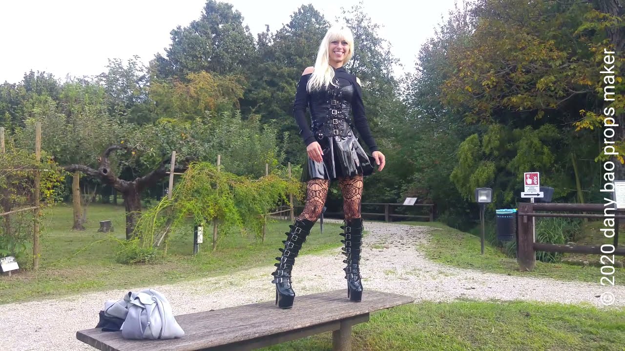 DANA LABO - walk in shiny pvc mini skirt, boots high heels, leather corset and coat