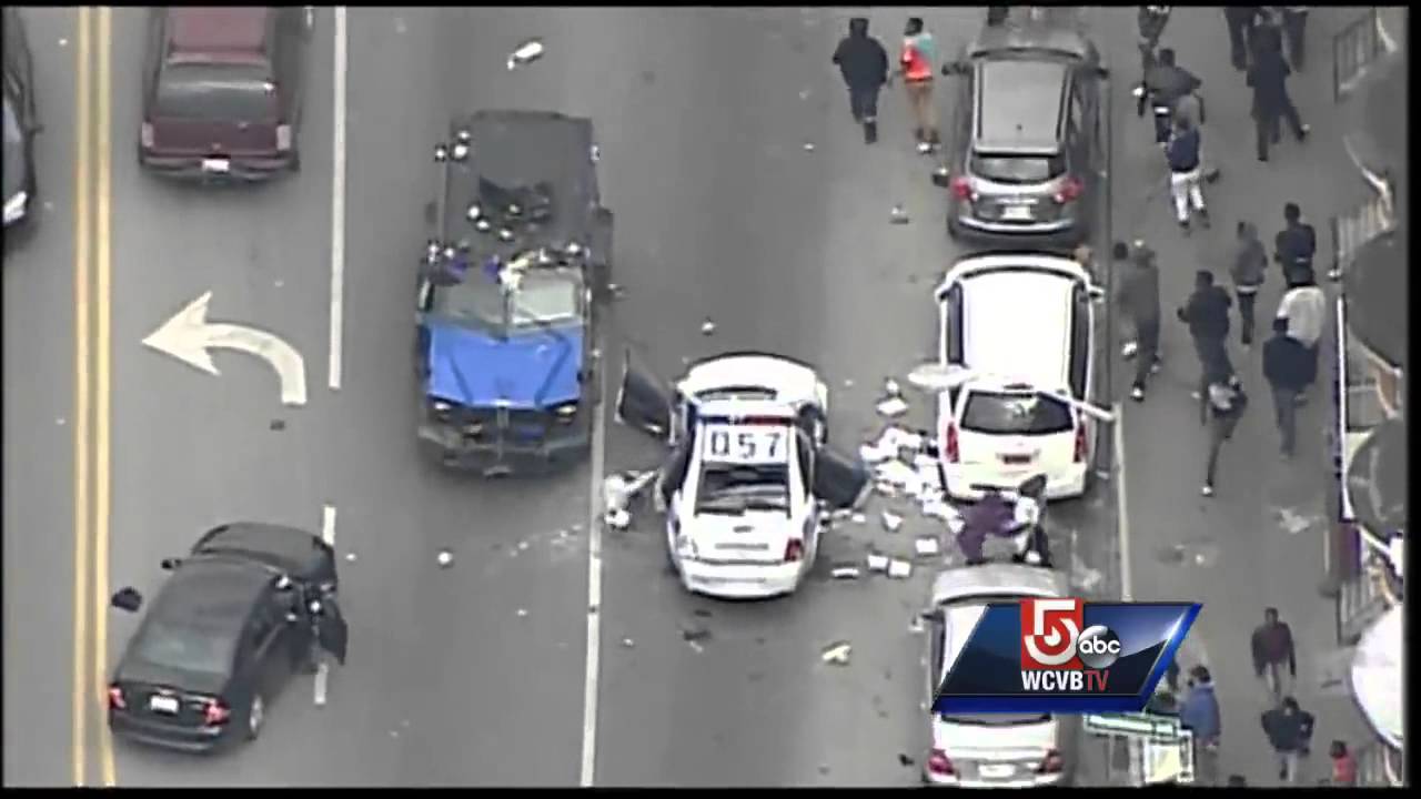 RAW Video: Rioters smash police vehicle with bats