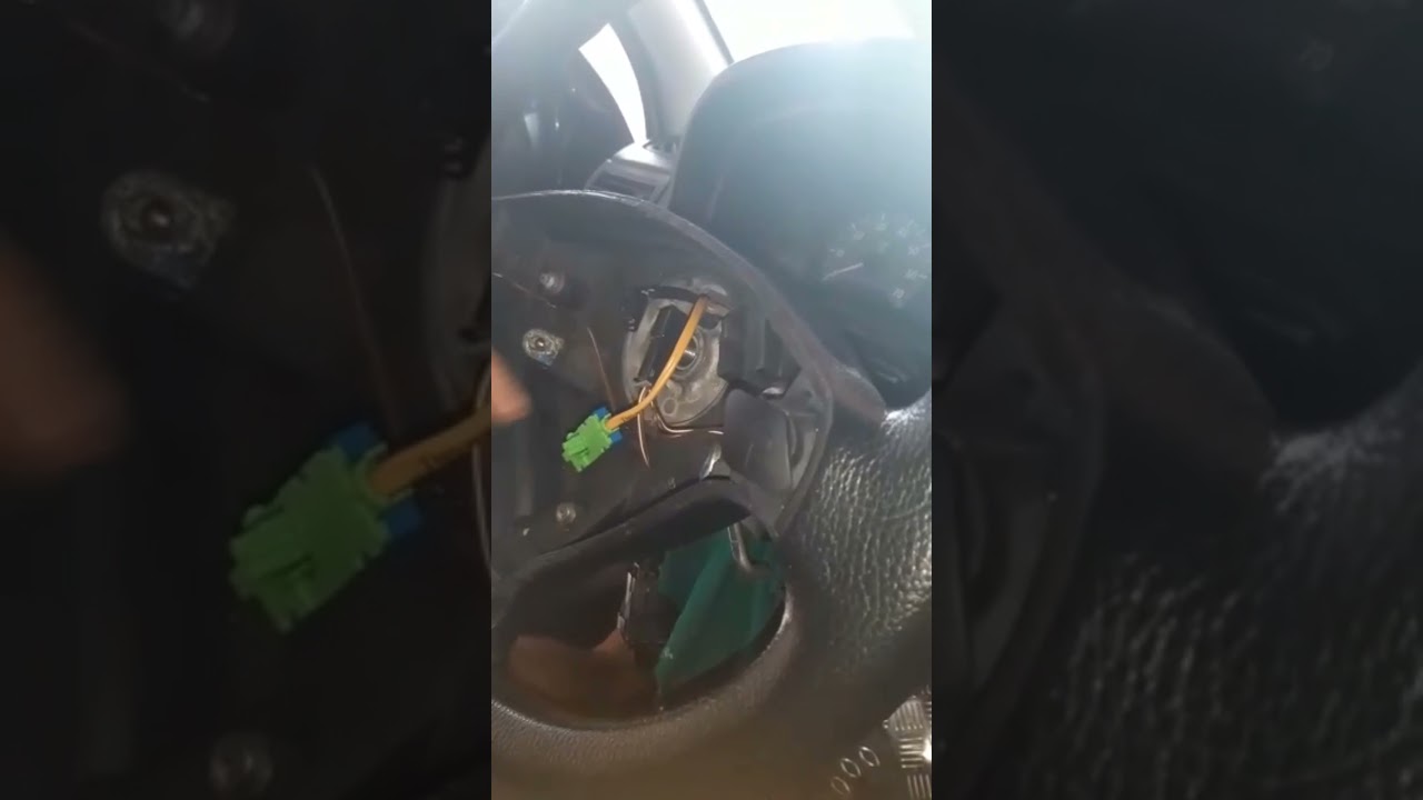 tirando o volante do astra com airbag