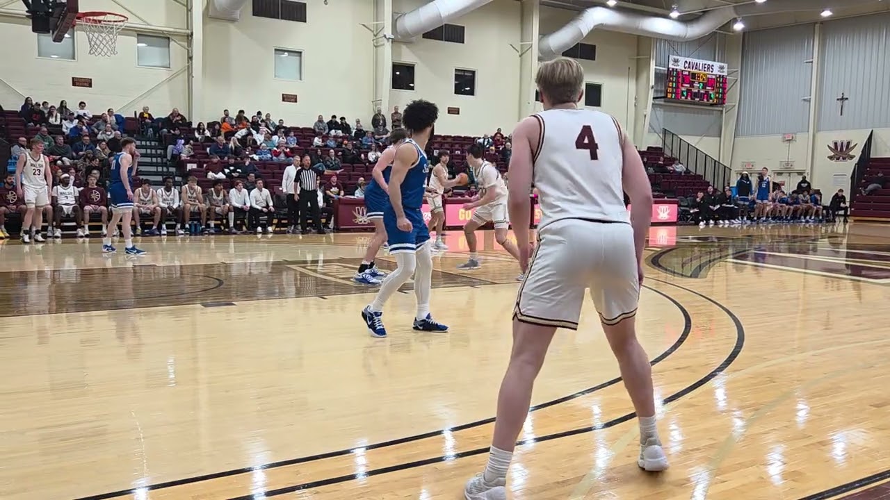Walsh's Kobe Mitchell drives and scores