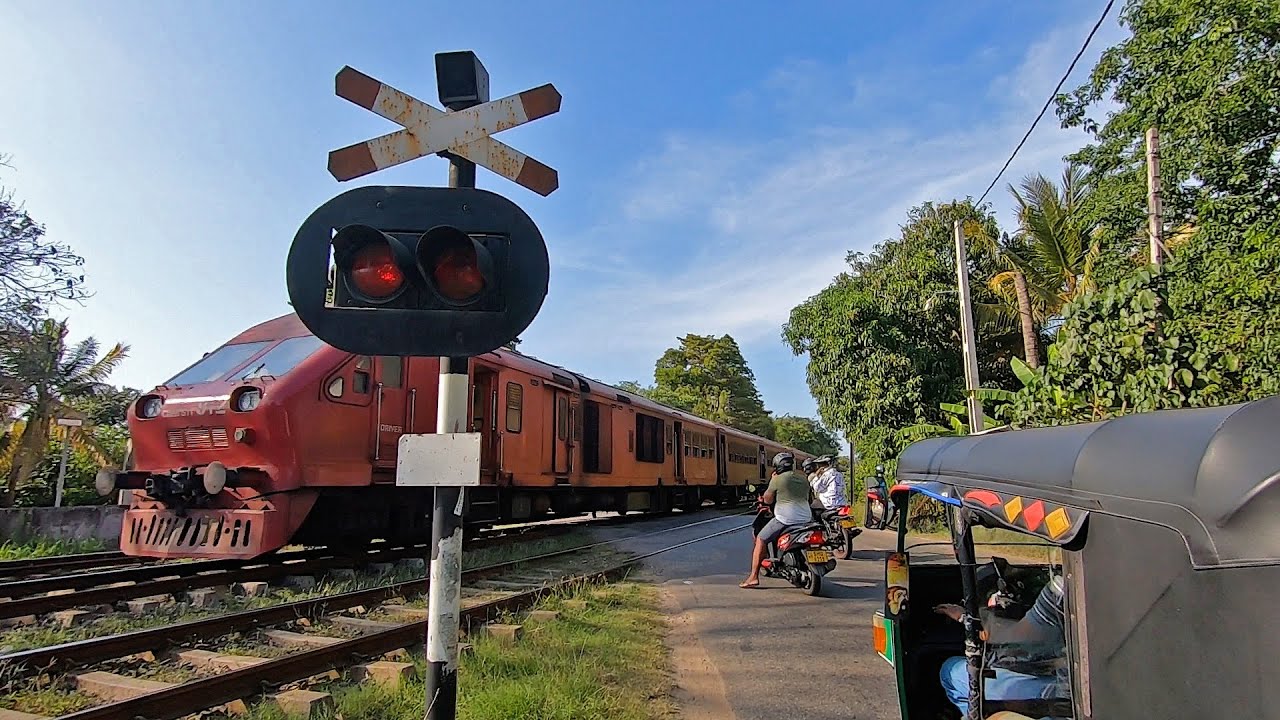 Wanawasala Road Railway Crossing with Indian Class S11 DMU in Sri Lanka