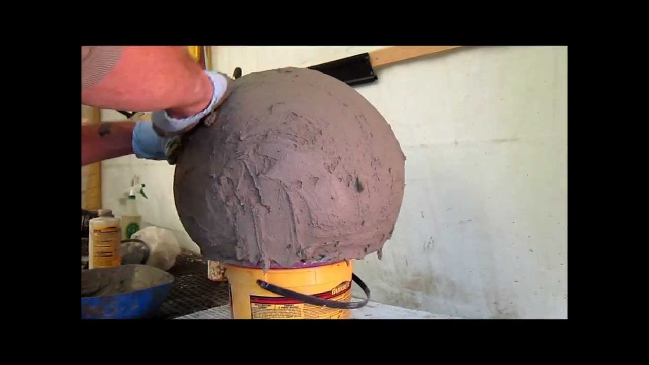 diymolds.com - Building up layers on a concrete hollow sphere.