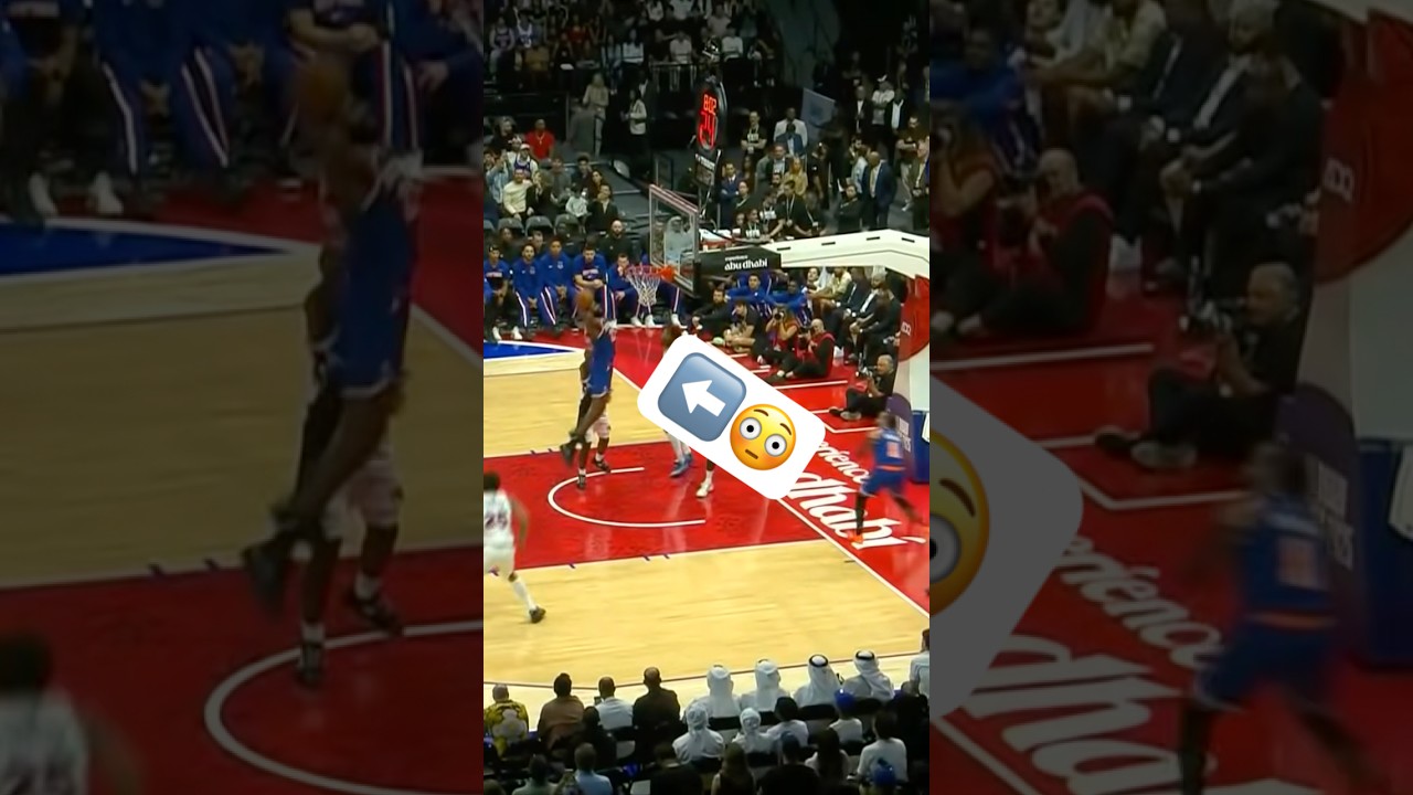 Mitchell Robinson reaches back for the put back!