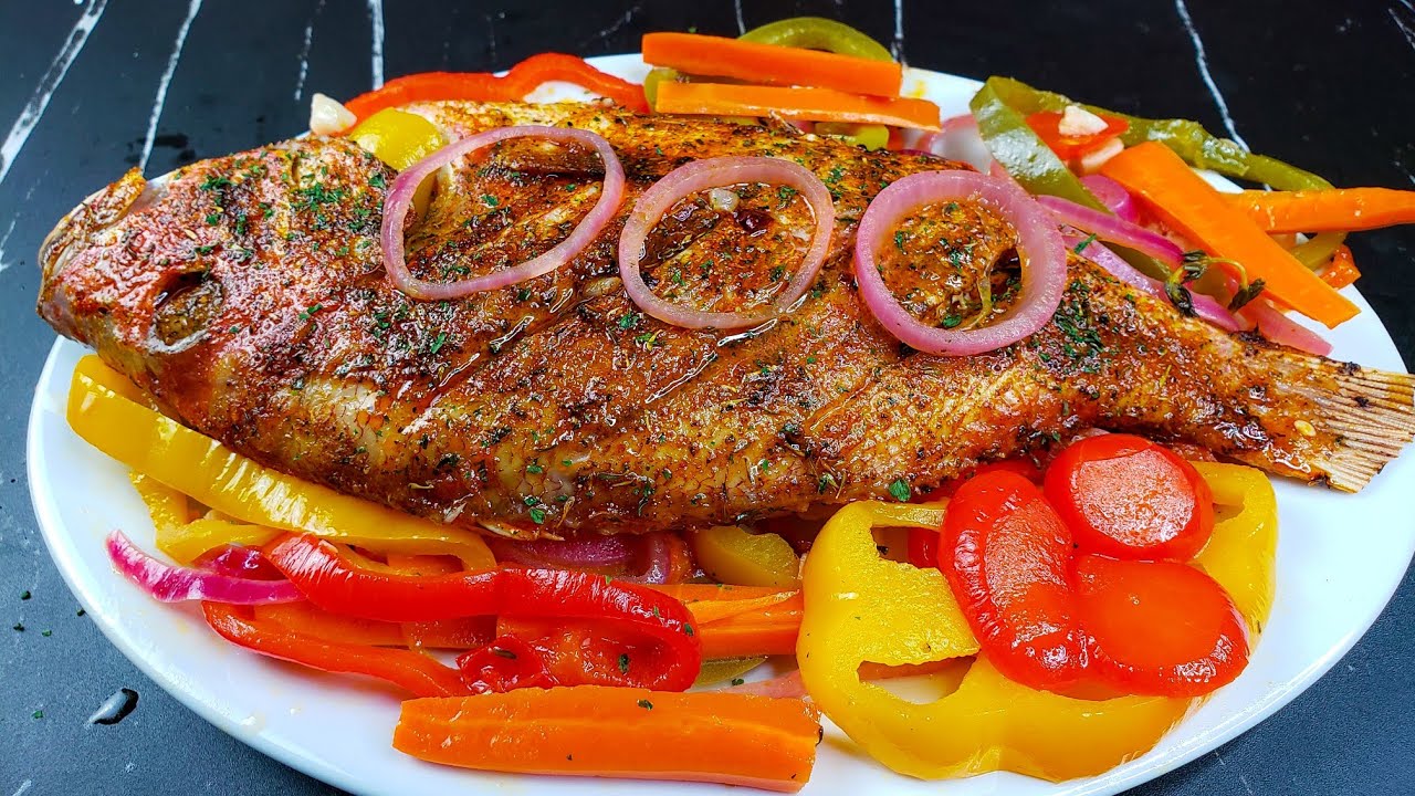 Вкусный рецепт запеченного в духовке красного окуня в стиле Эскович. Не жарьте рыбу, а готовьте н...