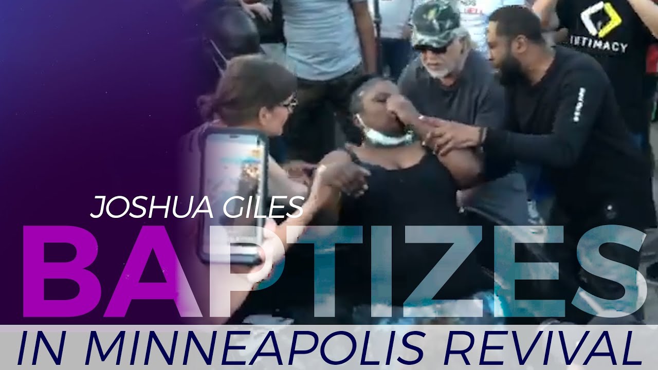 Joshua Giles Baptizes People At George Floyd Memorial Site 1