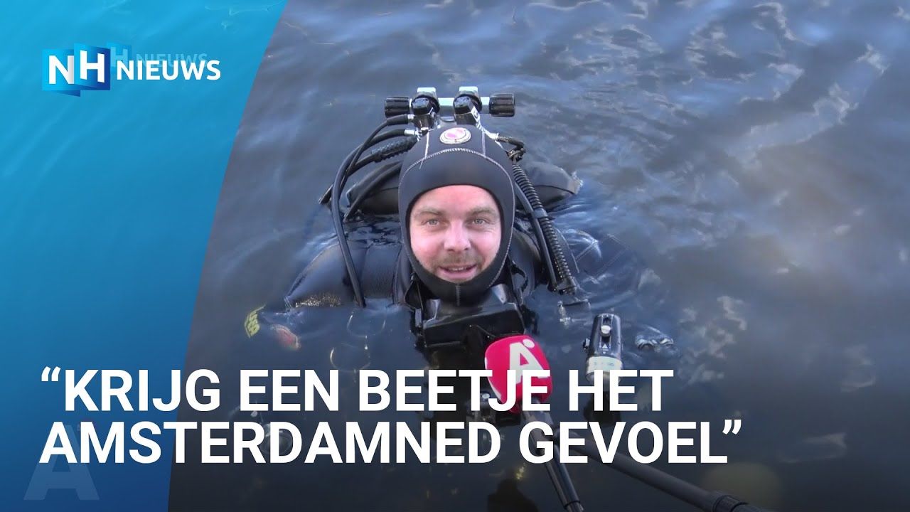 Duikers onderzoeken onderwaternatuur in Amsterdamse gracht