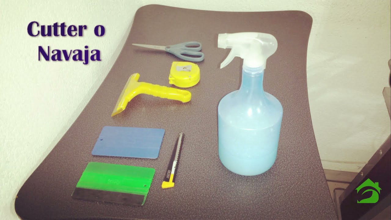Cómo instalar una lámina para vidrios