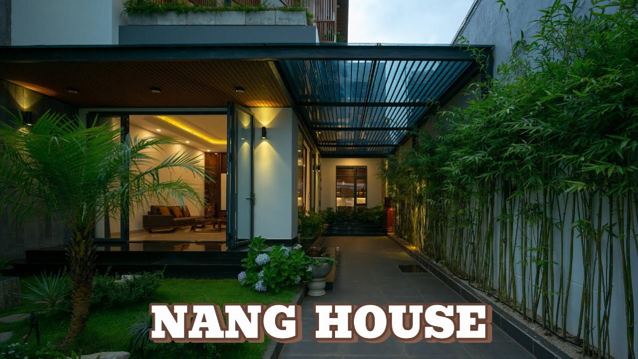 A Minimalist House with an Open Design, Blending Tropical Style and Nature.