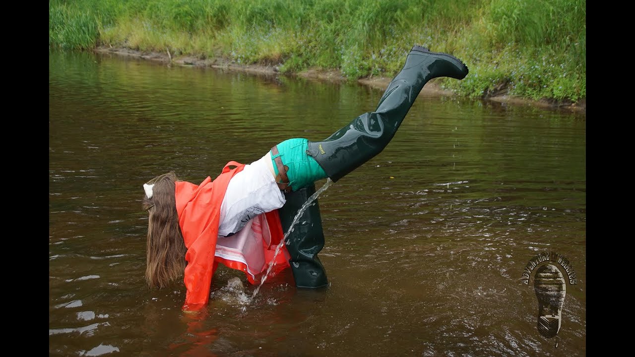 Rainwear walk (in waders and red raincoat)