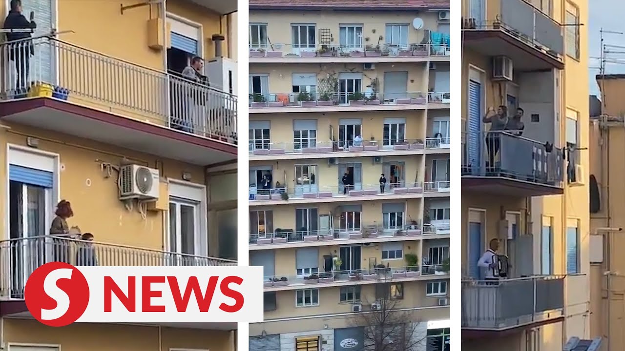 Italians show solidarity against coronavirus with music