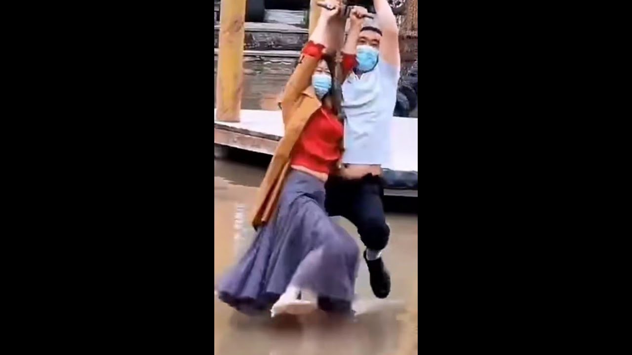 Wet boots and fall into water while playing sling on water