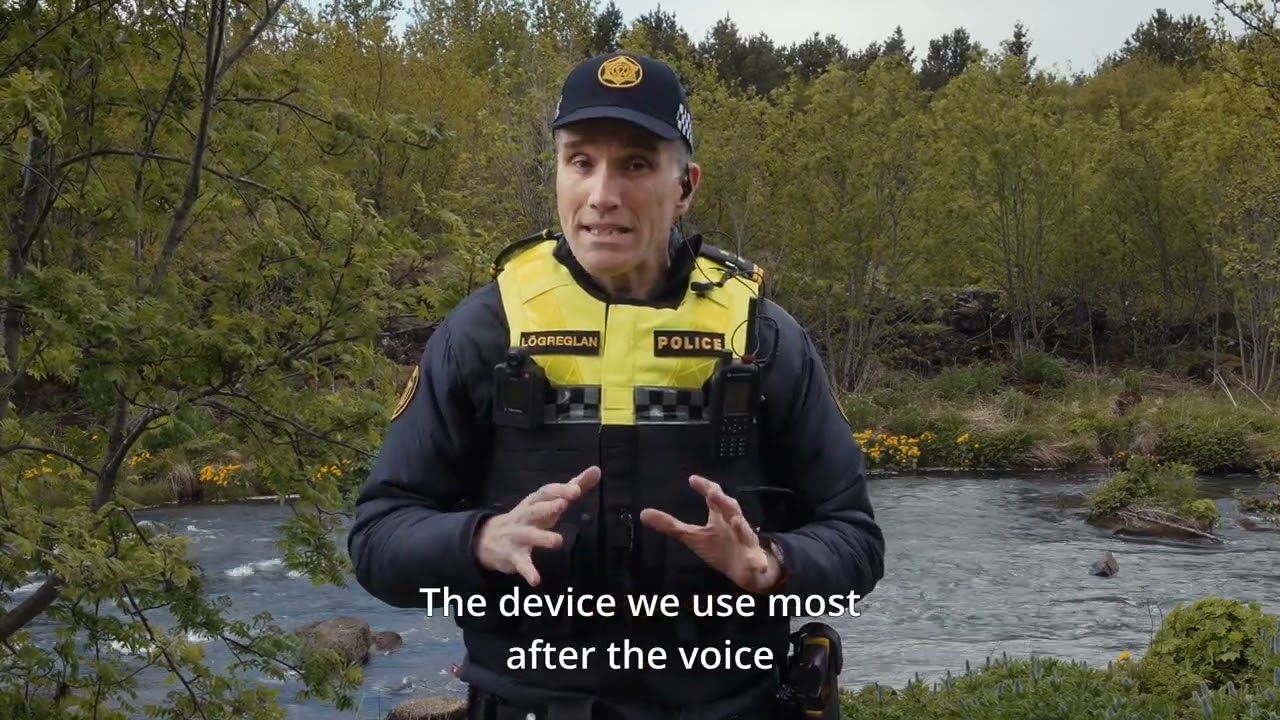 What does the cop carry in his belt?
