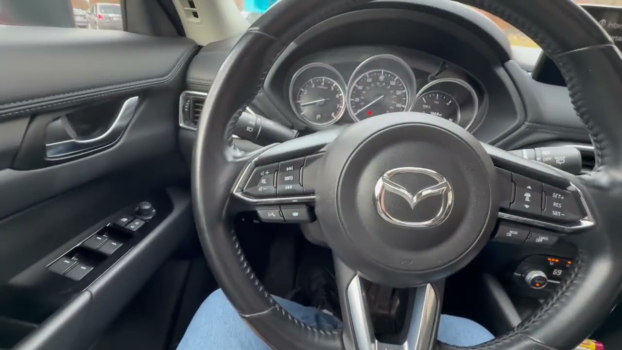 Советы по замене ремня безопасности и люка на Mazda CX-5