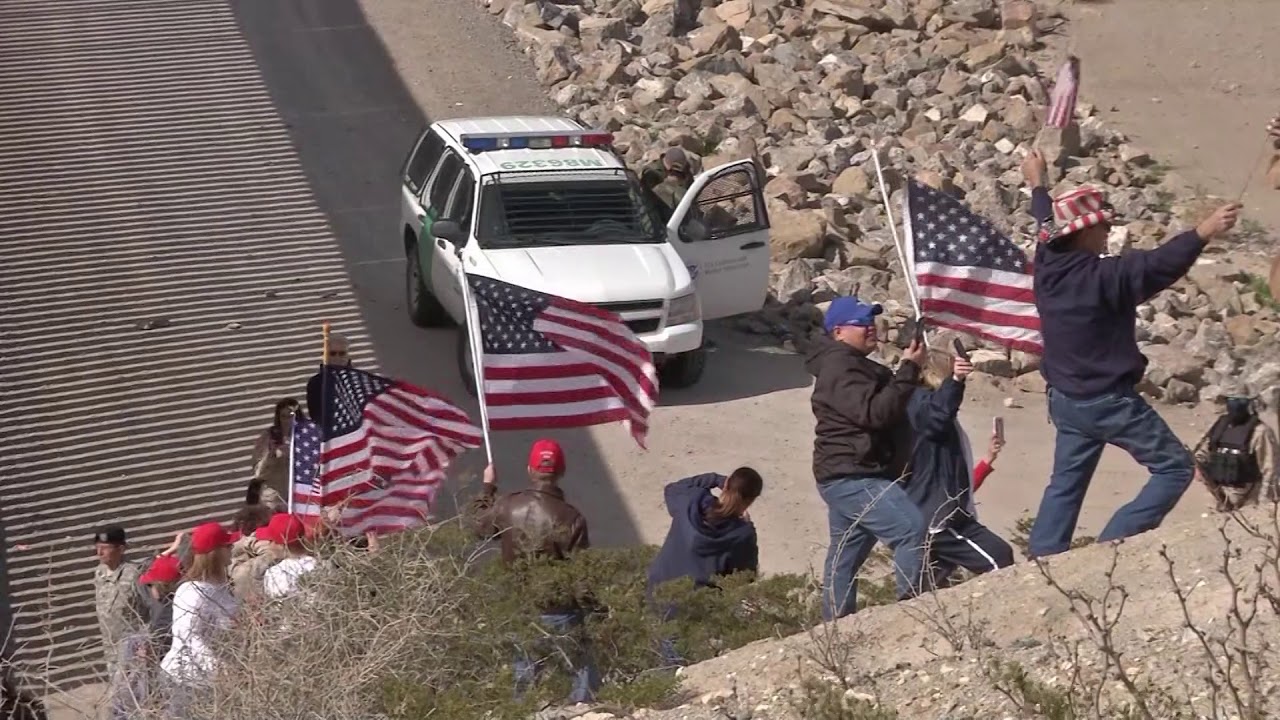 Dozens of Americans form human wall at the southern border ahead of Tump's El Paso visit