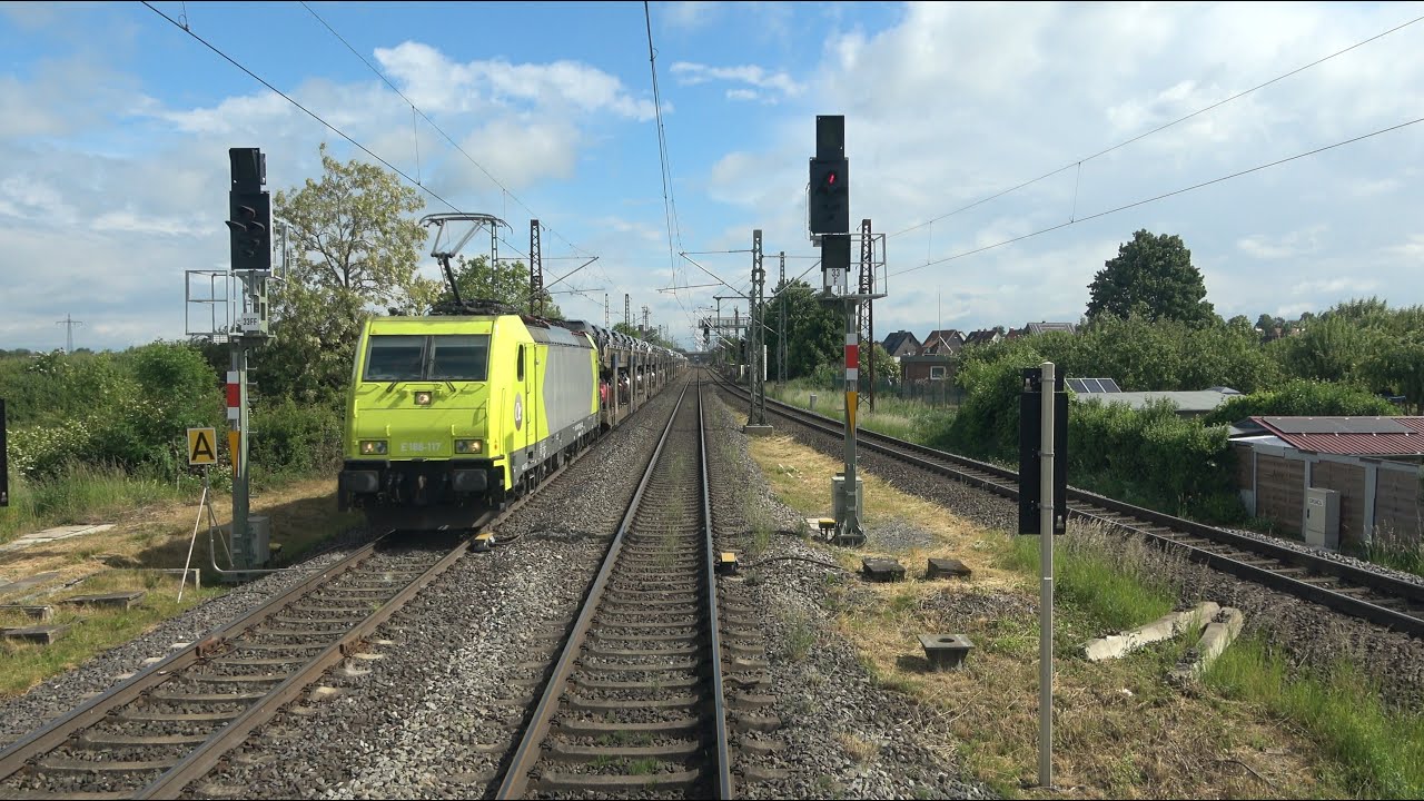 Nordstemmen (near Rössing); passing Alpha Trains loco E 186-117+freight train (20250528) (1 Clip)