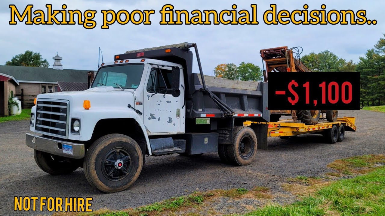 I went to the auction and spent all my money on junk. Dumpy tows home a Skytrak 710