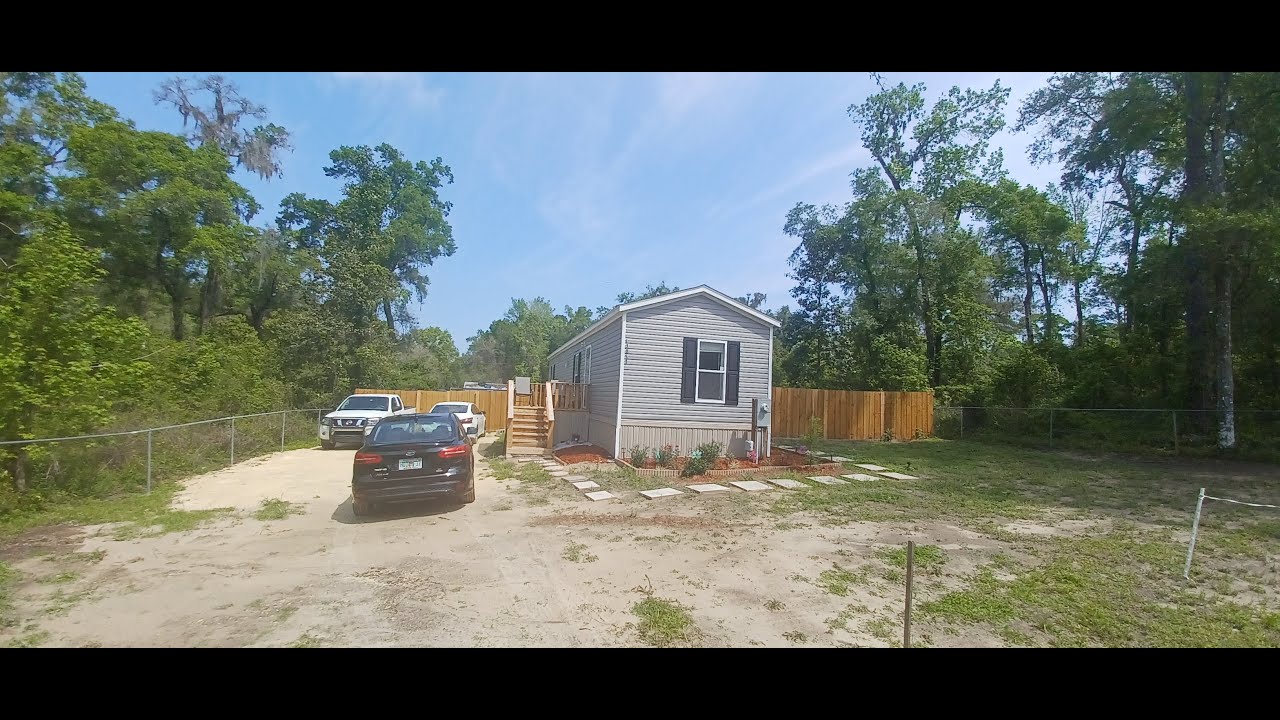 Los Costos de Comprar Propiedad y Ponerle un Mobile Home