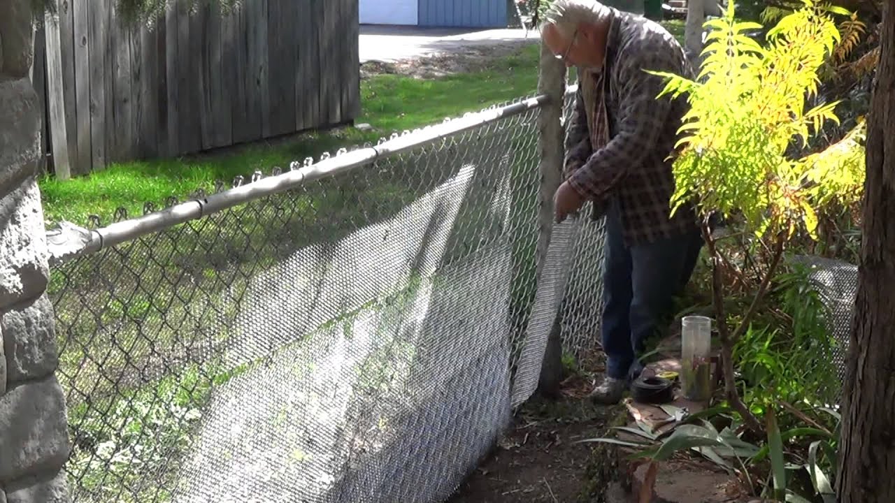 Converting my chain link fence to a stone wall