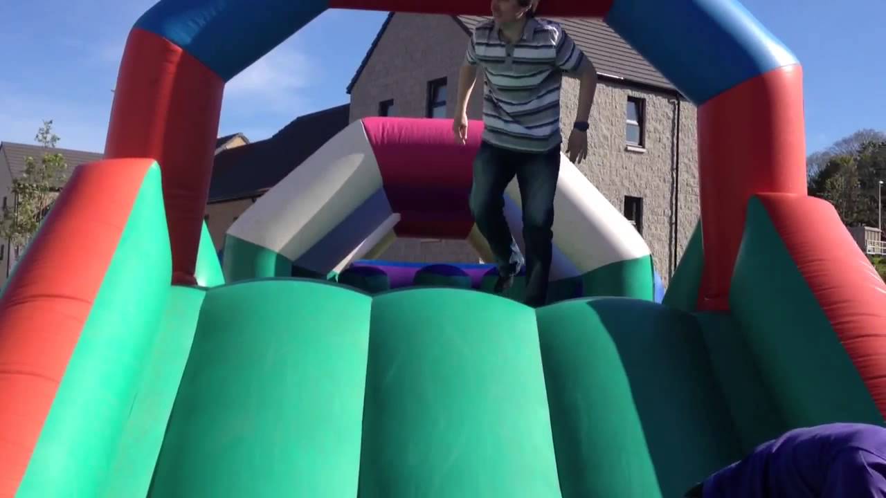 Donside Village adults on bouncy castle