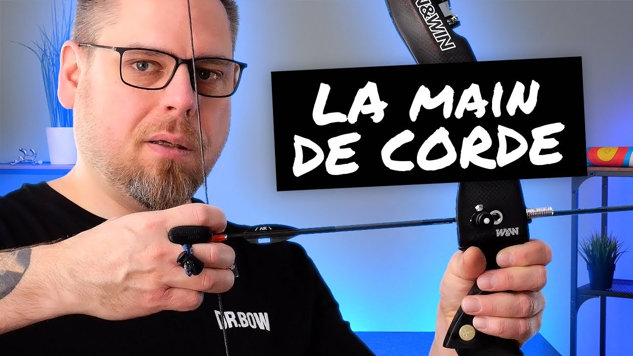 Bien placer sa main sur la corde de son arc