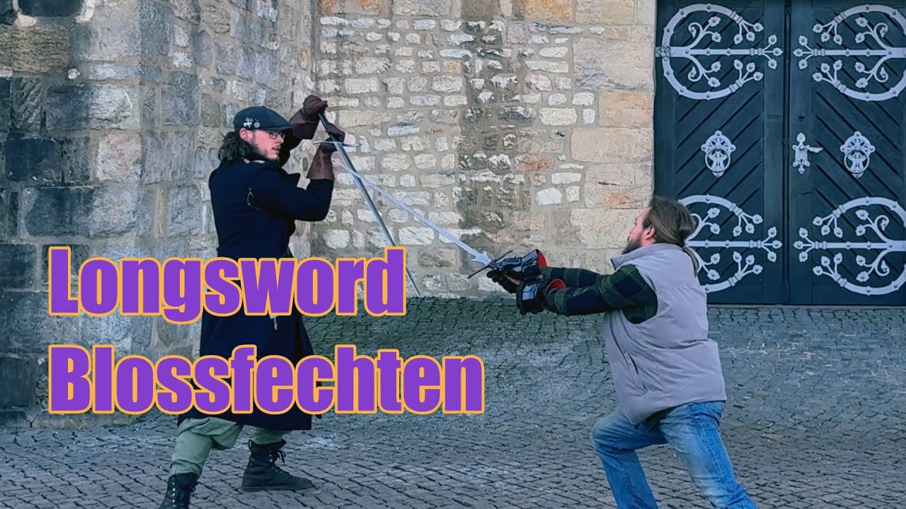 Two swordsmen longsword fight