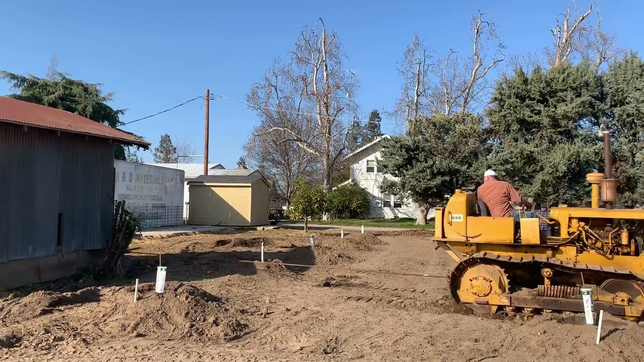Can the Cat D4D Pull Out this 100 Year Old Tree?? (Under A Building)