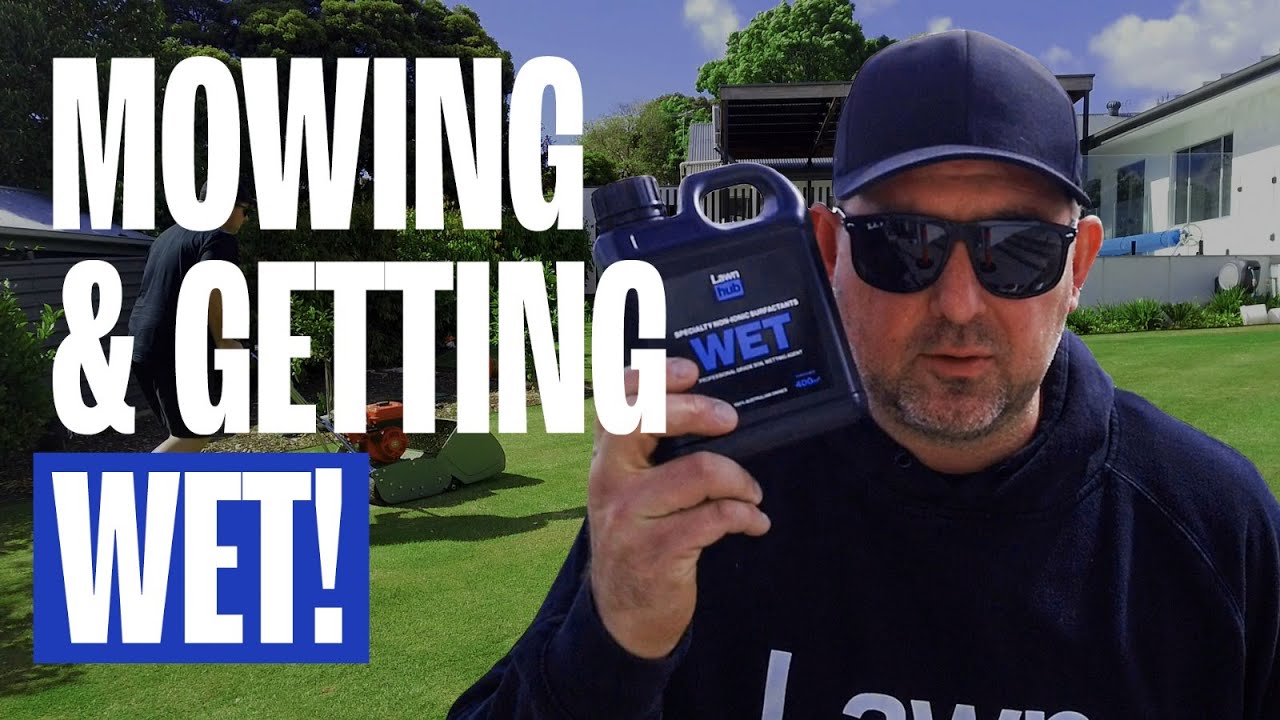 Giving my lawn a mow and getting WET!